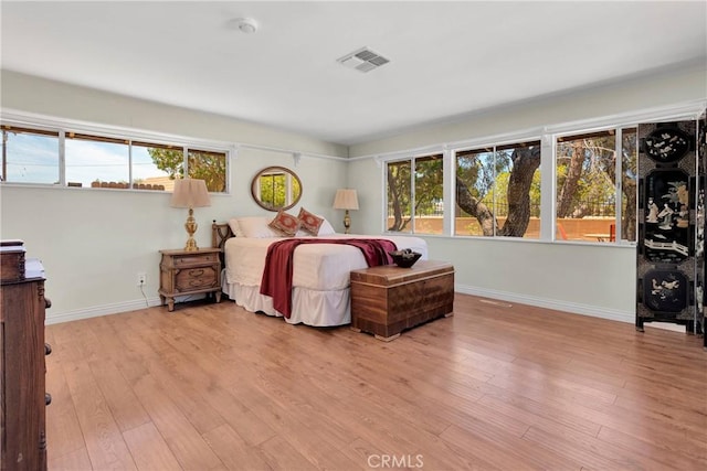19955 Chickasaw Rd, Apple Valley, CA 92307 - bedroom with light wood-style flooring and baseboards