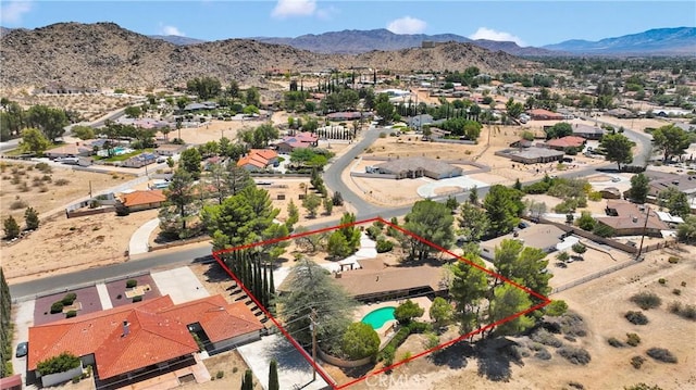 19955 Chickasaw Rd, Apple Valley, CA 92307 - aerial view of residential area with property parcel outlined and mountains