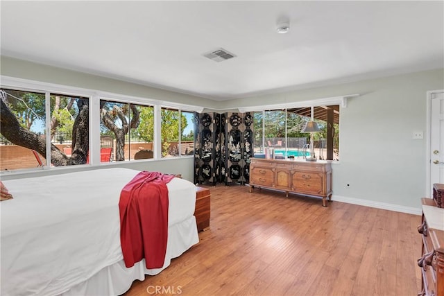 19955 Chickasaw Rd, Apple Valley, CA 92307 - bedroom featuring wood finished floors and baseboards