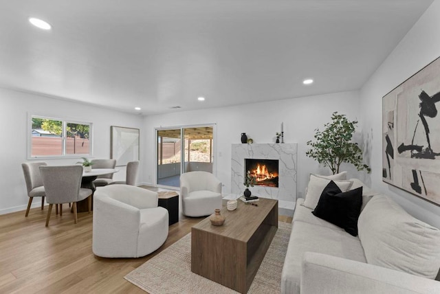1654 Yale St, Chula Vista, CA 91913 - living room with a premium fireplace, healthy amount of natural light, light wood finished floors, and recessed lighting