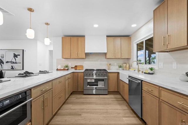 1654 Yale St, Chula Vista, CA 91913 - kitchen featuring appliances with stainless steel finishes, premium range hood, light wood finished floors, tasteful backsplash, and light stone countertops