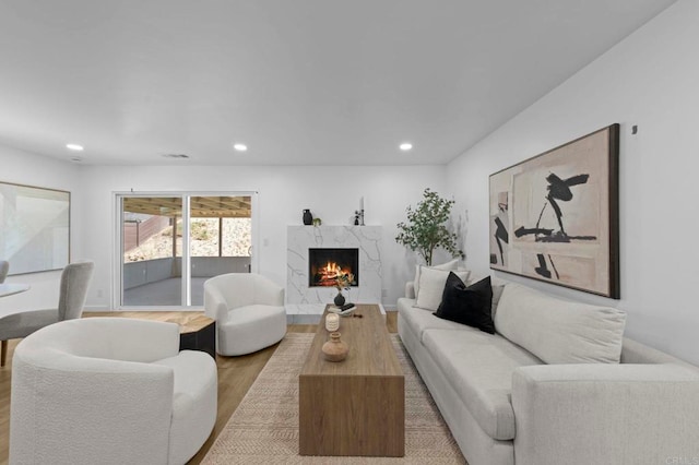 1654 Yale St, Chula Vista, CA 91913 - living room featuring wood finished floors, recessed lighting, and a high end fireplace