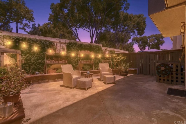 1148 Valdivia Ct, Chula Vista, CA 91910 - patio terrace at dusk featuring a patio and outdoor lounge area