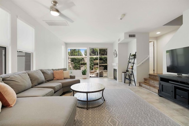1148 Valdivia Ct, Chula Vista, CA 91910 - living room featuring stairway, recessed lighting, light tile patterned flooring, and ceiling fan
