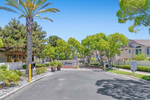 1148 Valdivia Ct, Chula Vista, CA 91910 - view of asphalt street with curbs, a gated entry, and a residential view