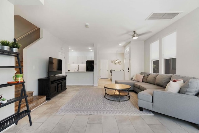 1148 Valdivia Ct, Chula Vista, CA 91910 - living area with ceiling fan and light tile patterned floors