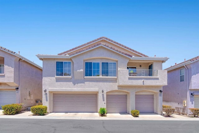 1148 Valdivia Ct, Chula Vista, CA 91910 - mediterranean / spanish home with a balcony, stucco siding, a garage, and a tile roof