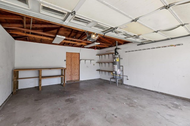 1220 Palomar Ter, Escondido, CA 92027 - garage featuring a garage door opener and water heater