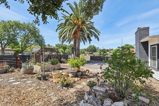1220 Palomar Ter, Escondido, CA 92027 - fenced backyard with a garden