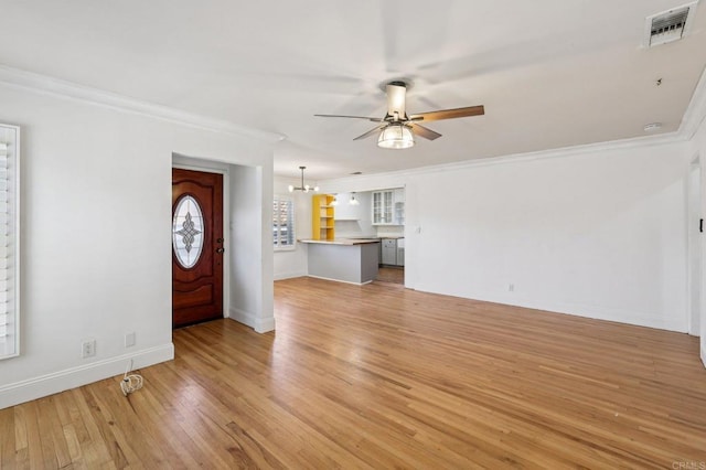 1220 Palomar Ter, Escondido, CA 92027 - unfurnished living room with ornamental molding, a ceiling fan, light wood-type flooring, and a chandelier