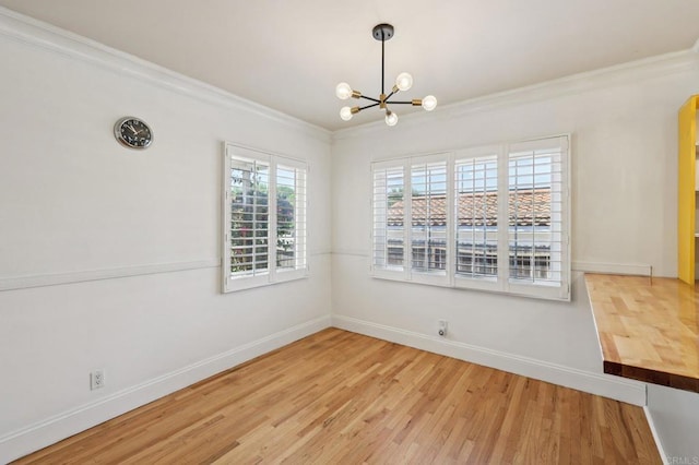 1220 Palomar Ter, Escondido, CA 92027 - unfurnished dining area featuring ornamental molding, a chandelier, and light wood-style floors