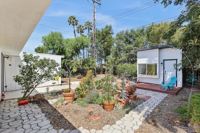 1220 Palomar Ter, Escondido, CA 92027 - view of yard featuring a deck and a shed