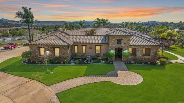 14786 Cool Valley Ranch Rd, Valley Center, CA 92082 - mediterranean / spanish home with a tile roof, a mountain view, stone siding, and stucco siding