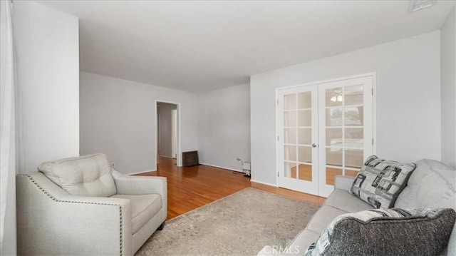 1193 Winston Ct, Upland, CA 91786 - sitting room featuring french doors and wood finished floors