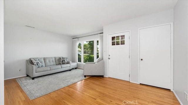 1193 Winston Ct, Upland, CA 91786 - living room with light wood finished floors