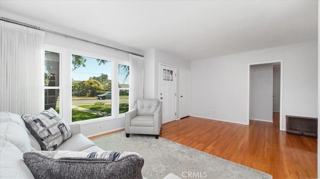 1193 Winston Ct, Upland, CA 91786 - living area with wood finished floors and baseboards