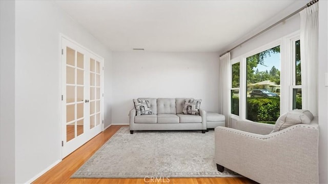 1193 Winston Ct, Upland, CA 91786 - living room with wood finished floors and baseboards