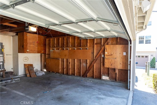 1841 Fisher Dr Unit B, Oxnard, CA 93035 - garage with a garage door opener and water heater