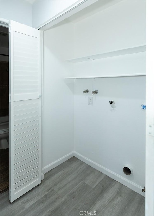 1841 Fisher Dr Unit B, Oxnard, CA 93035 - washroom featuring wood finished floors and hookup for a washing machine