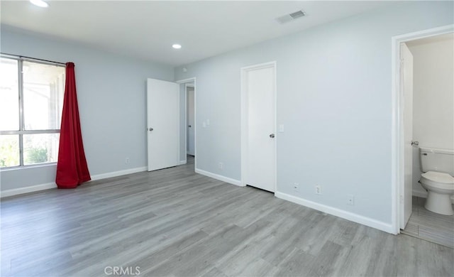 1841 Fisher Dr Unit B, Oxnard, CA 93035 - unfurnished bedroom with recessed lighting, wood finished floors, and ensuite bathroom