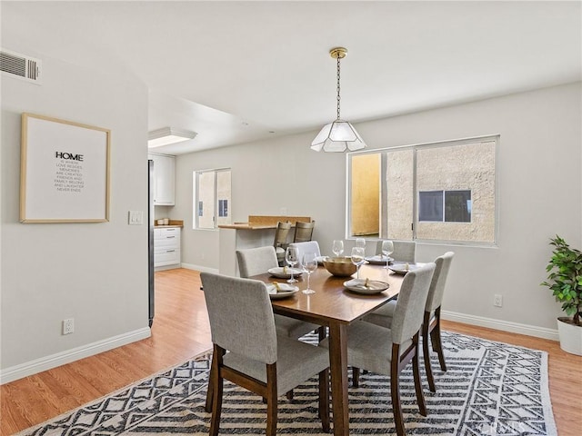 9531 Via Ricardo, Sun Valley, CA 91504 - dining area featuring light wood-style flooring and plenty of natural light