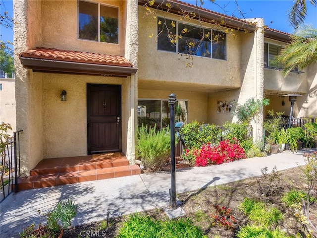 9531 Via Ricardo, Sun Valley, CA 91504 - view of exterior entry with stucco siding and a tiled roof