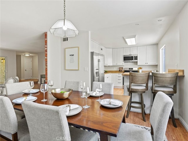 9531 Via Ricardo, Sun Valley, CA 91504 - dining area featuring light wood-style floors