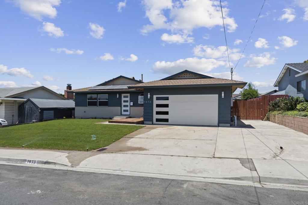 1673 Ithaca St, Chula Vista, CA 91913 - view of front of house featuring an attached garage and driveway