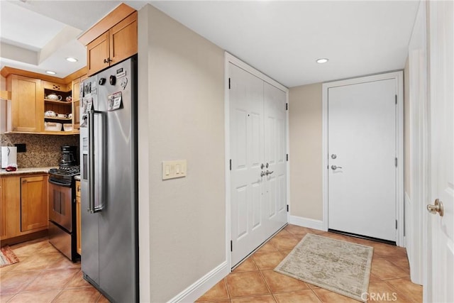887 San Juan Cir, Duarte, CA 91010 - kitchen featuring stainless steel appliances, recessed lighting, light tile patterned flooring, decorative backsplash, and light countertops
