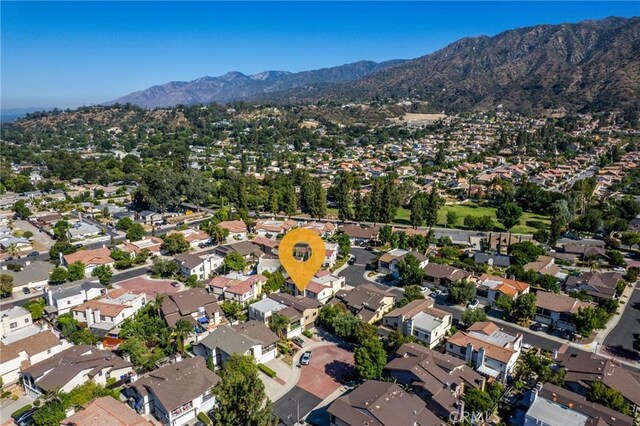 887 San Juan Cir, Duarte, CA 91010 - aerial overview of property's location featuring a mountainous background and nearby suburban area