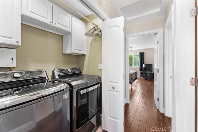 887 San Juan Cir, Duarte, CA 91010 - washroom with washing machine and clothes dryer, dark wood-style floors, attic access, and cabinet space