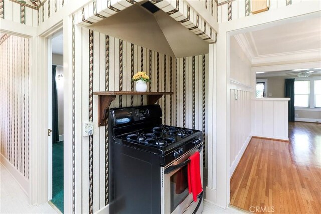 845 N Curtis Ave, Alhambra, CA 91801 - kitchen featuring black gas range, ornamental molding, wood finished floors, wallpapered walls, and a ceiling fan
