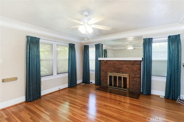 845 N Curtis Ave, Alhambra, CA 91801 - unfurnished living room featuring a ceiling fan, wood finished floors, crown molding, and a brick fireplace