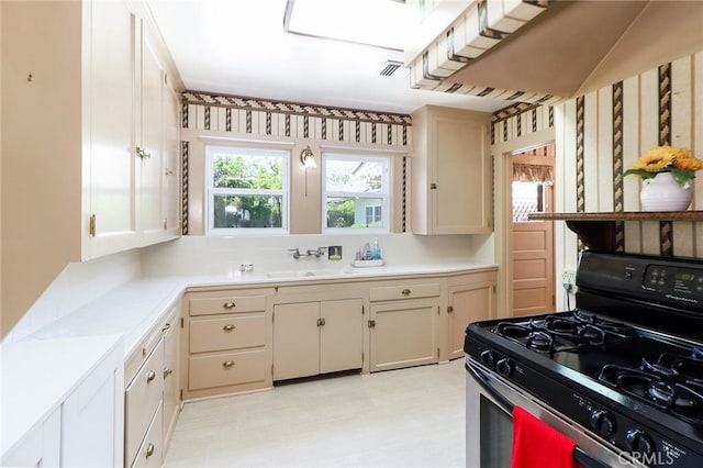 845 N Curtis Ave, Alhambra, CA 91801 - kitchen with black gas range, light countertops, and light floors