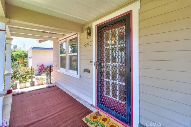 845 N Curtis Ave, Alhambra, CA 91801 - view of exterior entry featuring a porch