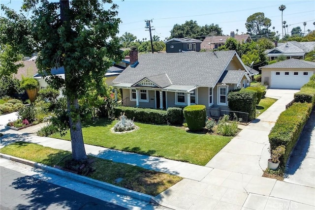 845 N Curtis Ave, Alhambra, CA 91801 - view of front of house with a front yard, a chimney, roof with shingles, and a residential view
