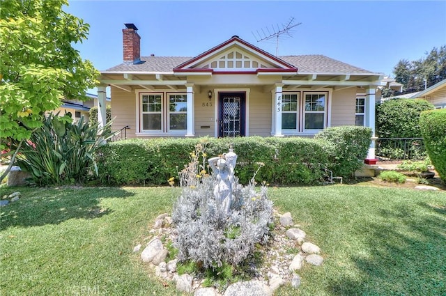 845 N Curtis Ave, Alhambra, CA 91801 - view of front facade featuring a chimney, a front lawn, and a shingled roof