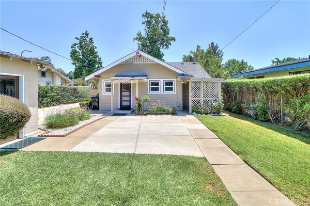 845 N Curtis Ave, Alhambra, CA 91801 - bungalow-style house featuring a front lawn and a patio
