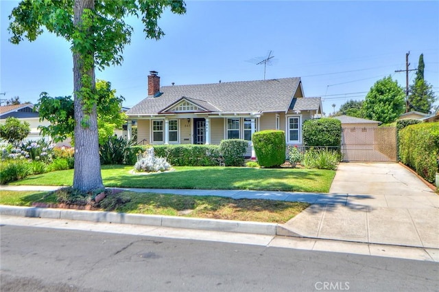 845 N Curtis Ave, Alhambra, CA 91801 - bungalow featuring a front yard, a chimney, driveway, and a gate