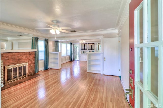 845 N Curtis Ave, Alhambra, CA 91801 - unfurnished living room featuring light wood-style floors, a brick fireplace, ceiling fan, and crown molding