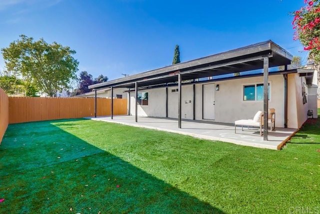 9753 Ivanho St, Spring Valley, CA 91977 - back of property with a patio area, a fenced backyard, and stucco siding