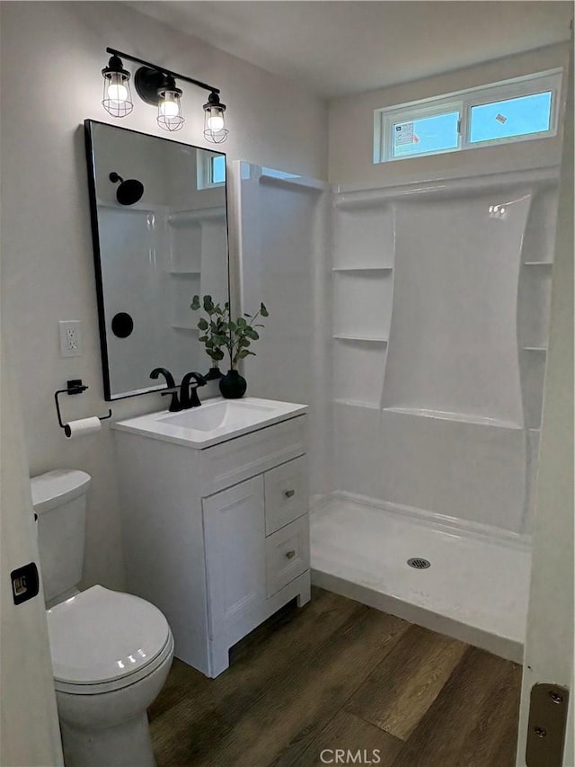 1526 W 54th St, Los Angeles, CA 90062 - full bath with wood finished floors, a shower, and vanity