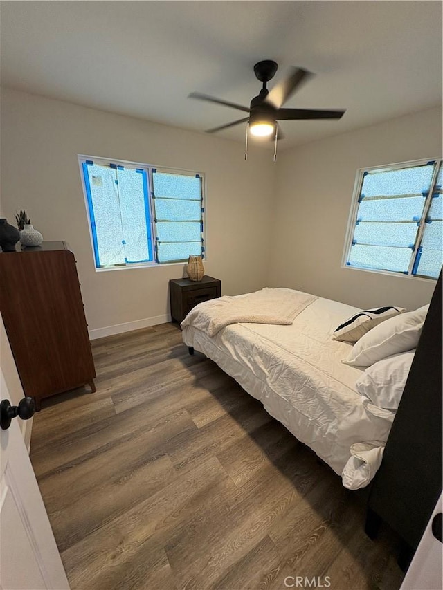 1526 W 54th St, Los Angeles, CA 90062 - bedroom with wood finished floors and a ceiling fan