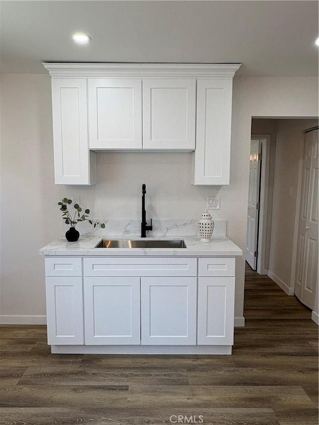1526 W 54th St, Los Angeles, CA 90062 - kitchen featuring white cabinetry, dark wood finished floors, recessed lighting, and light stone counters