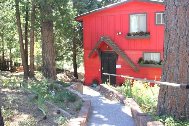 31705 Silver Spruce Dr, Running Springs, CA 92382 - view of front of house with board and batten siding