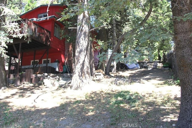 31705 Silver Spruce Dr, Running Springs, CA 92382 - view of yard with a wooden deck