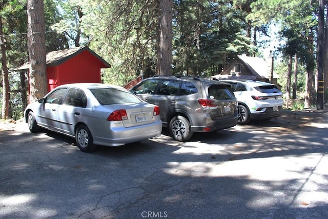 31705 Silver Spruce Dr, Running Springs, CA 92382 - view of uncovered parking lot
