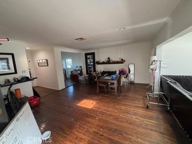 13600 Sylvan St, Valley Glen, CA 91401 - dining room featuring hardwood / wood-style flooring and ornamental molding