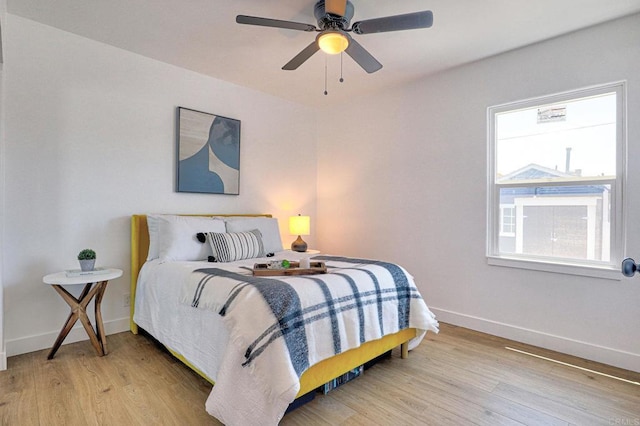 4711 Landis St, San Diego, CA 92105 - bedroom with light wood-type flooring and ceiling fan