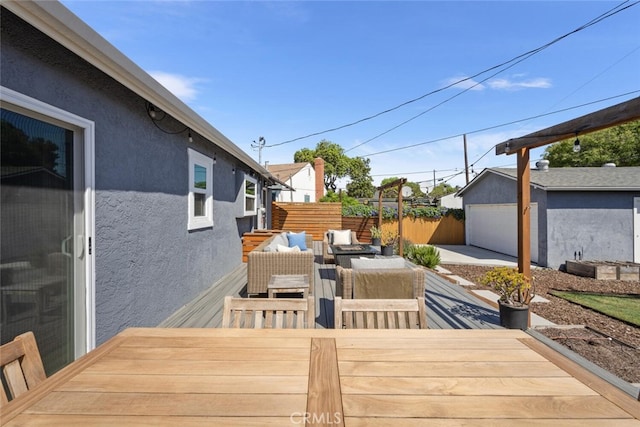4513 E Cervato St, Long Beach, CA 90815 - deck with an outbuilding, outdoor lounge area, and a garage